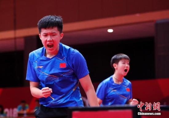 資料圖：雅加達(dá)亞運(yùn)會(huì)，王楚欽/孫穎莎奪得混雙冠軍。 <a target='_blank' href='/'>中新社</a>記者 劉關(guān)關(guān) 攝