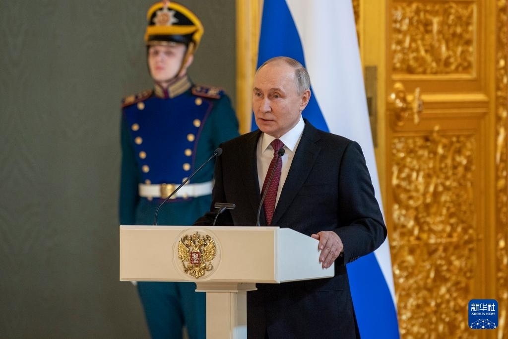 3月20日，俄羅斯總統(tǒng)普京在莫斯科克里姆林宮與其競選團(tuán)隊(duì)代表舉行見面會。新華社記者 曹陽 攝