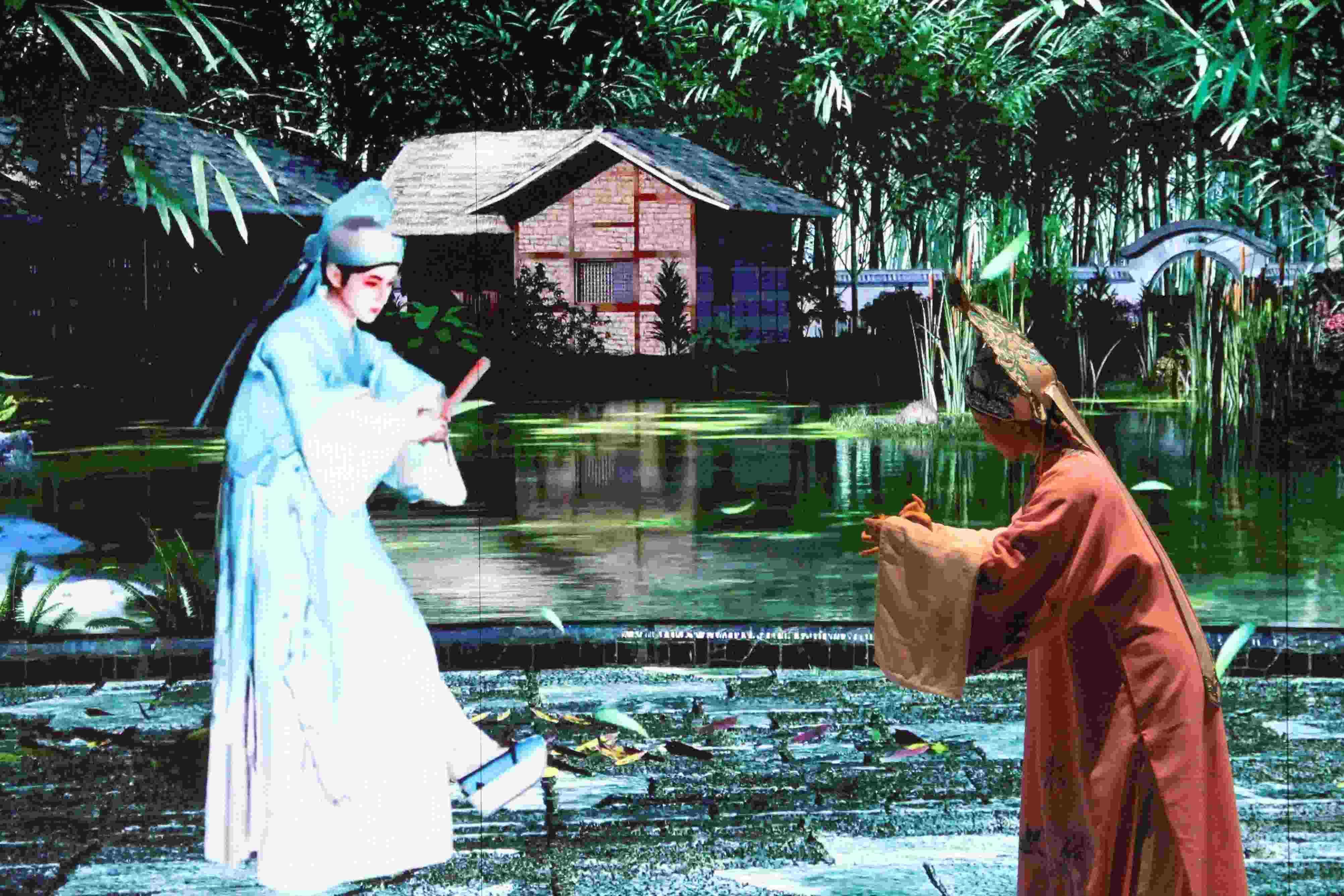 真人演員與虛擬人演員在“元啟金陵”南京數(shù)字文化客廳出演《梁山伯與祝英臺》經(jīng)典選段。受訪者供圖