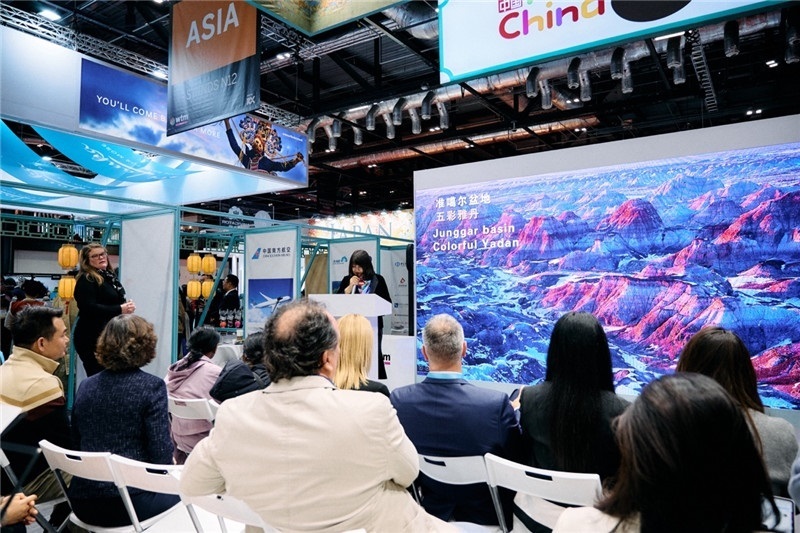  “中國館”新疆旅游推介會現(xiàn)場介紹。楊浩鵬攝